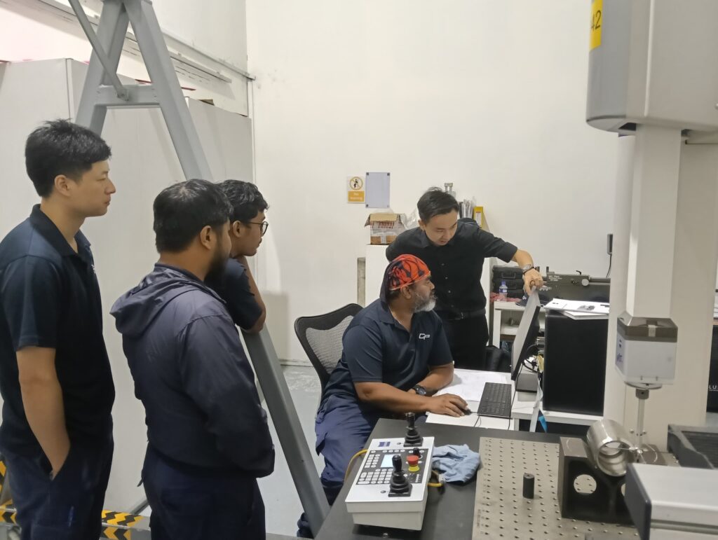An expert giving VMM training to few people